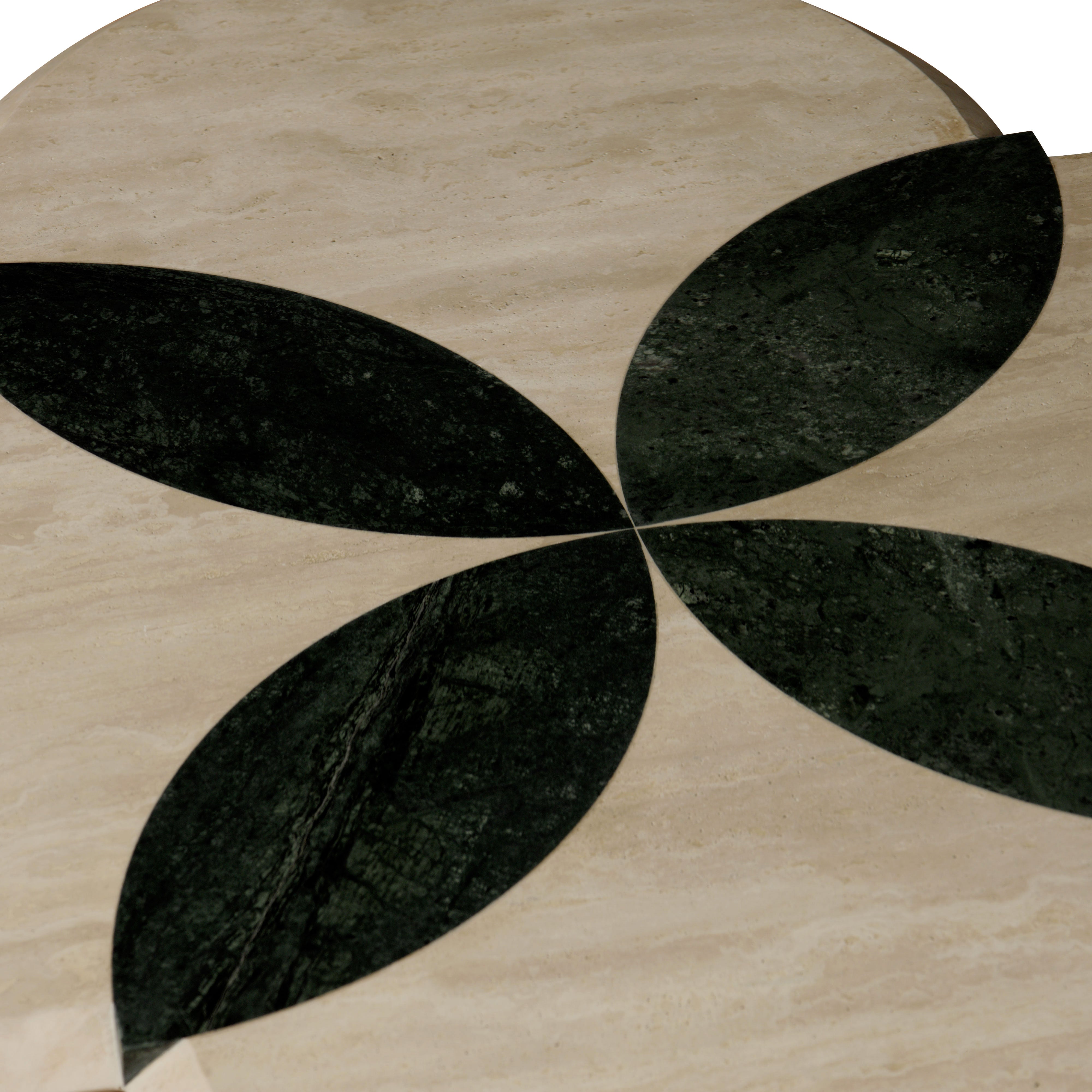 green leaf patterns made from stone in the center of Bloom Coffe Table   