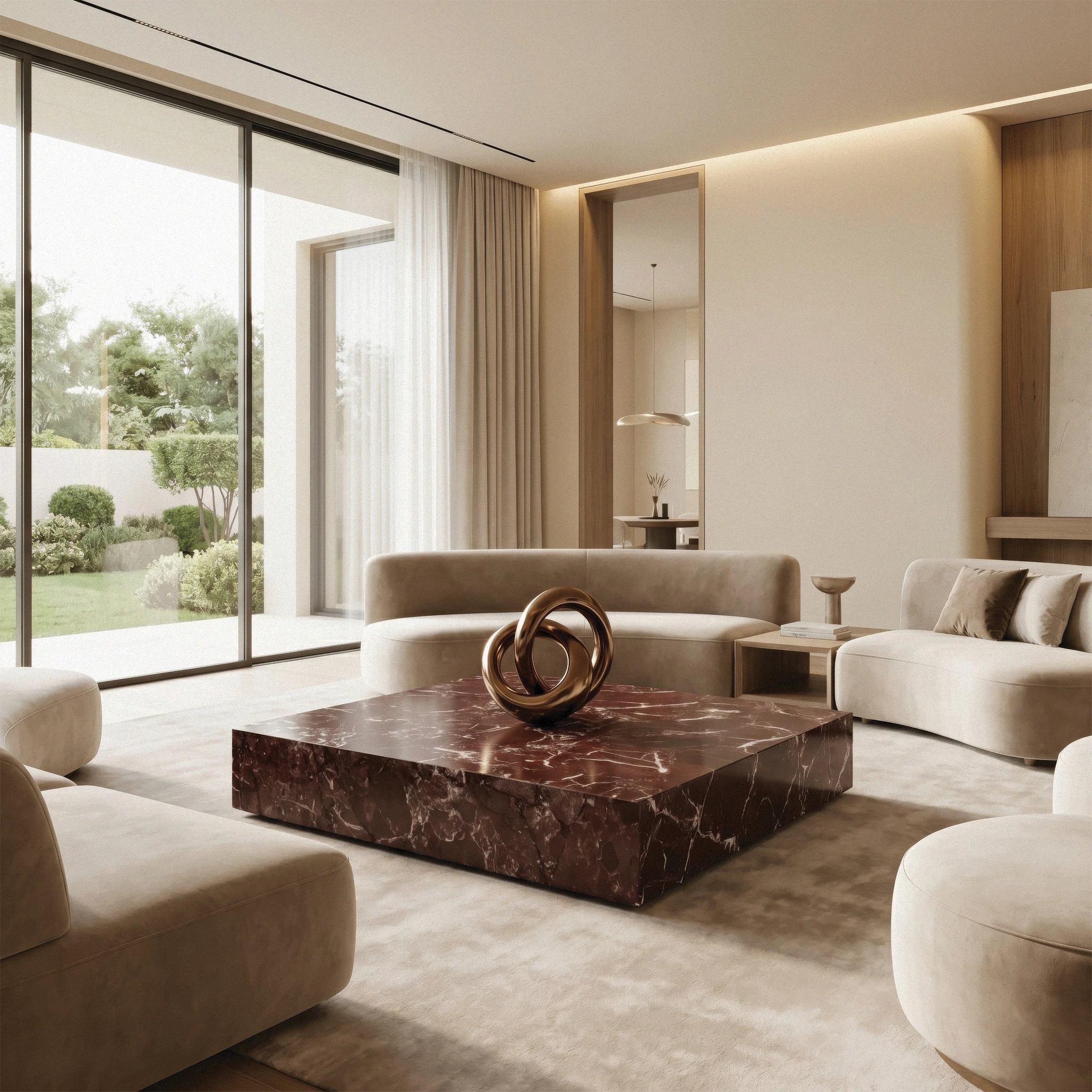 Kirmizi Coffee Table from Marbeya Charm in a living room with large window view on green patio